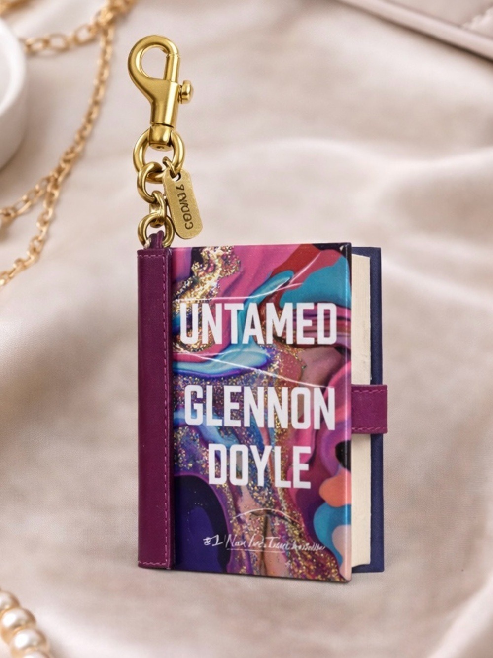 NEW Coach Untamed by Glennon Doyle Book Bag Charm NWT